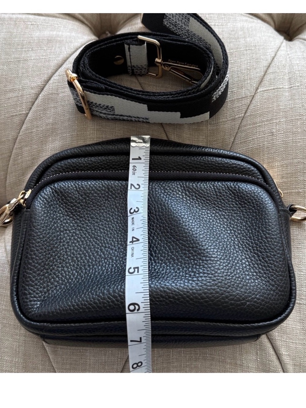 Compact Black Pebble Crossbody with Patterned Strap - Picture 8 of 12